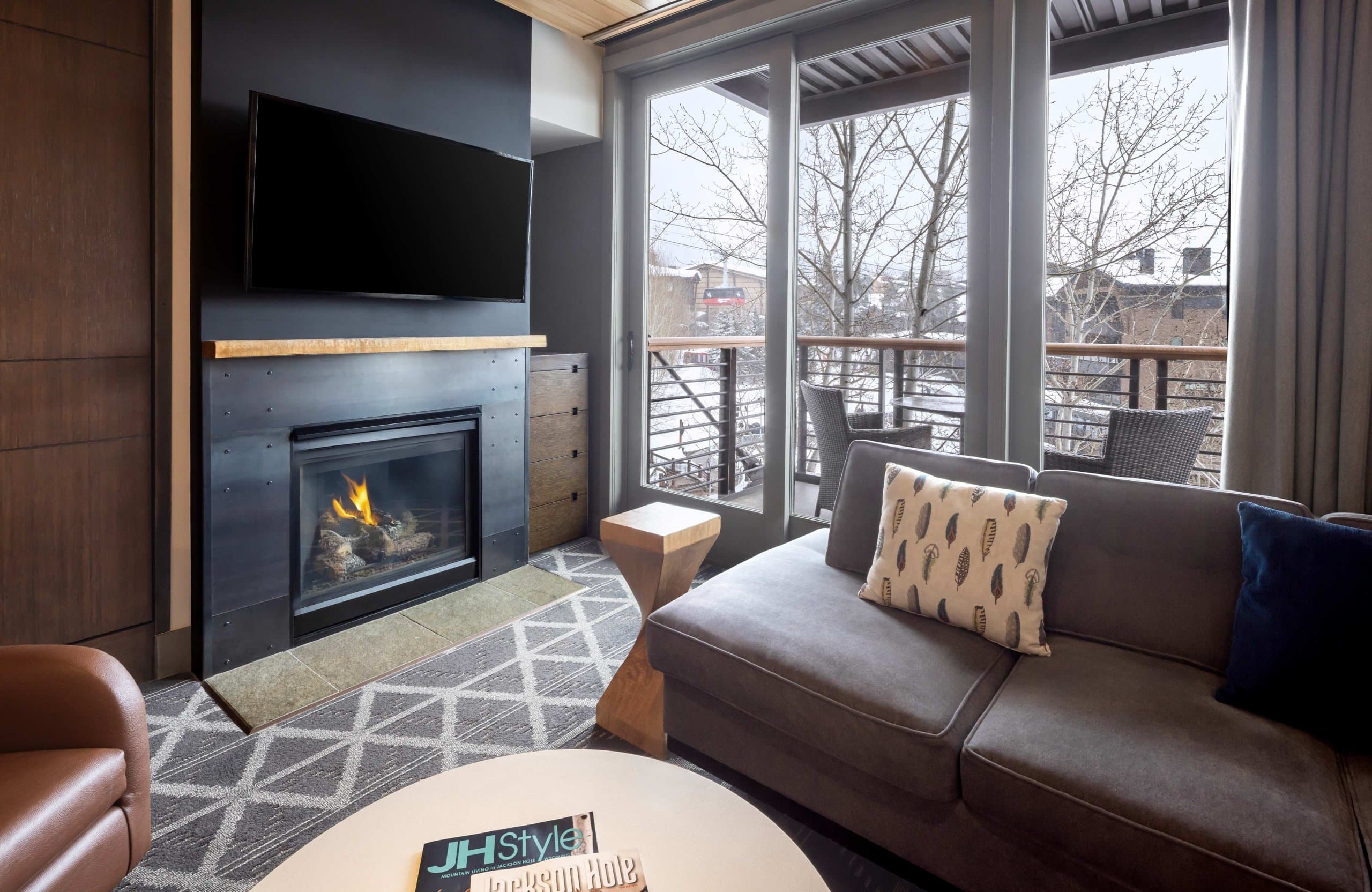 A fireplace and sitting area in a room at Hotel Terra in the Urban Studio Suite