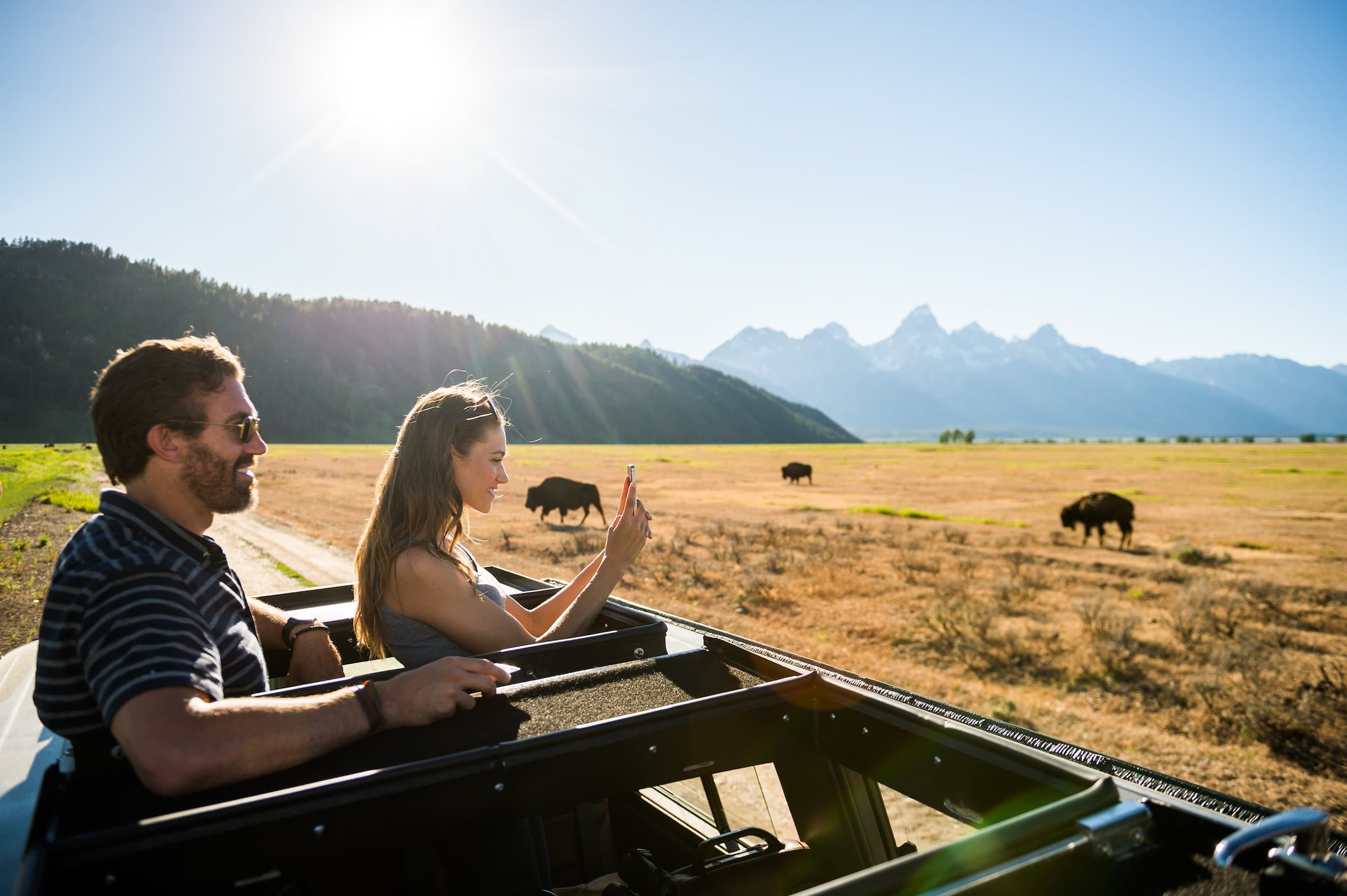 A couple enjoying a Wildlife Safari offered by Hotel Terra
