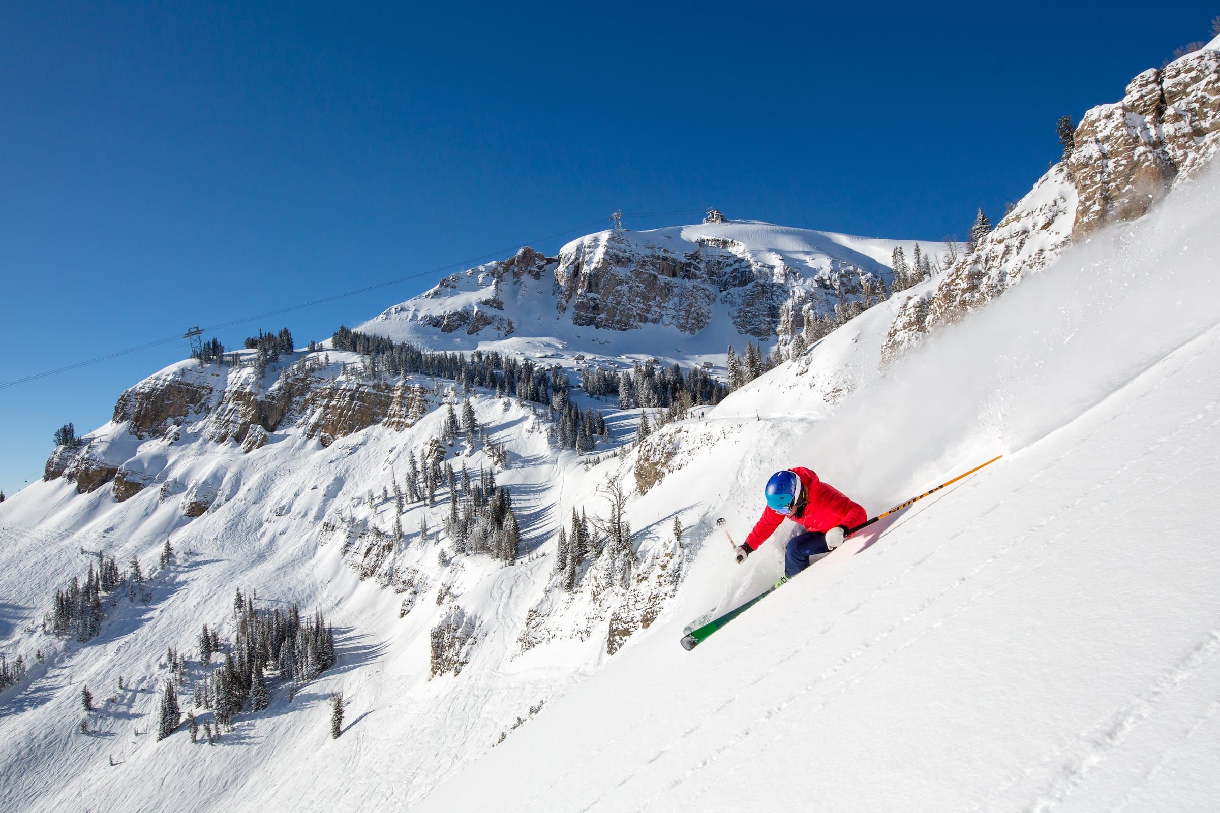 A skier heading down a mountain in Jackson Hole, Wyoming.