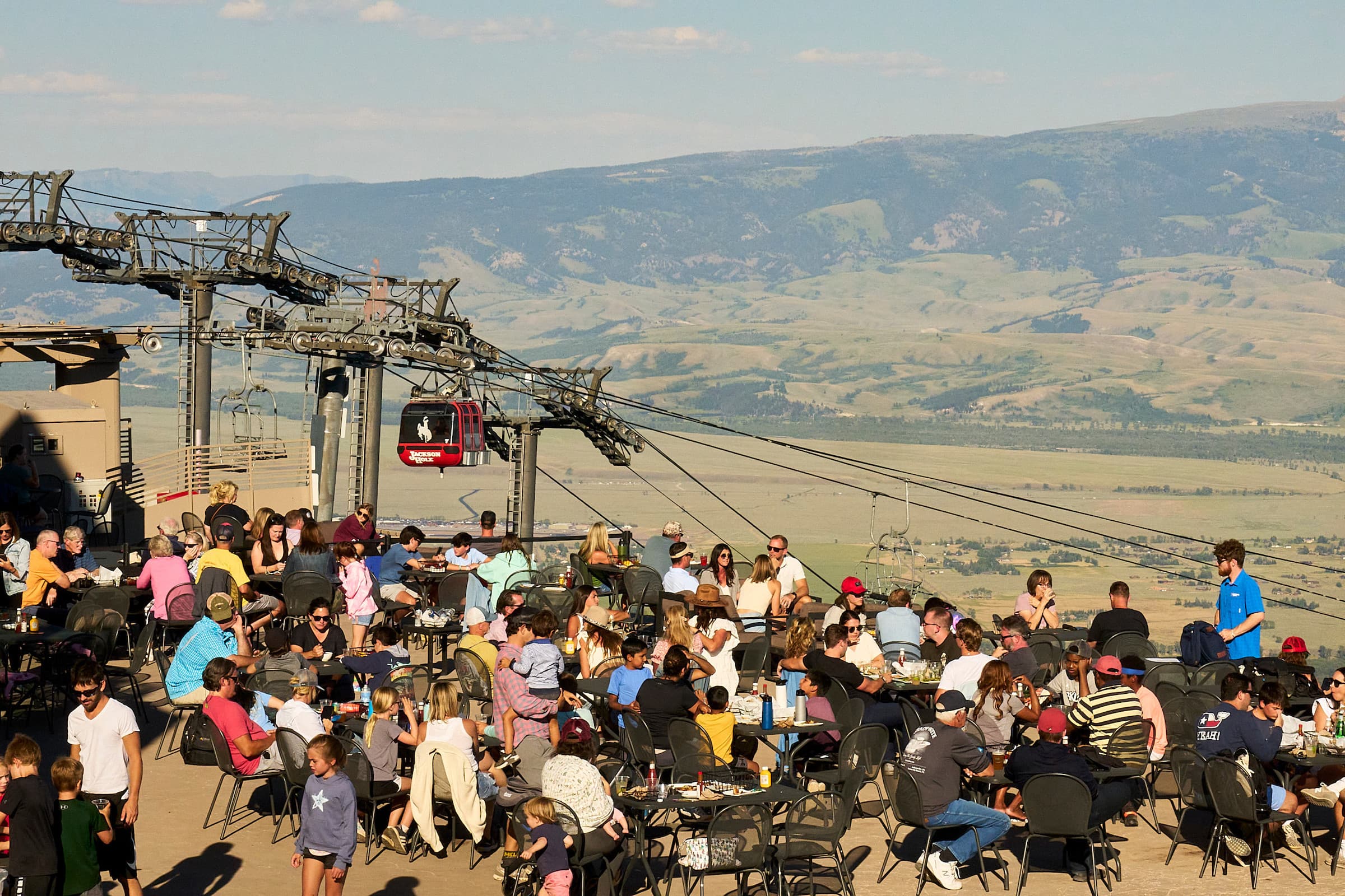 Tables and chairs set up on top of a mountain in Jackson Hole, Wyoming