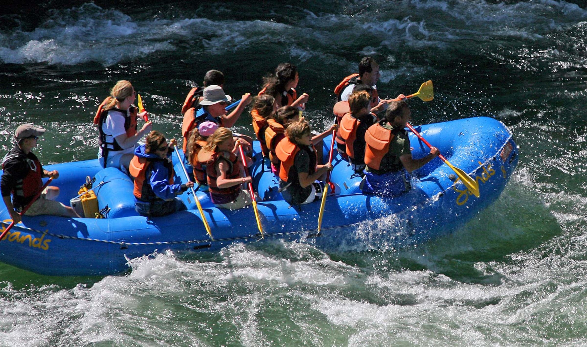 A group white water rafting in Jackson Hole, Wyoming