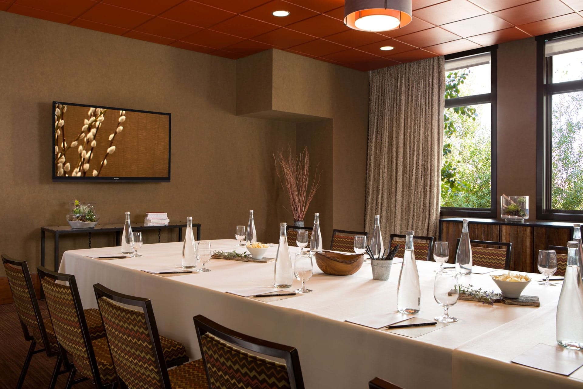 Interior of the Craighead Room set up for a small meeting event in Hotel Terra Jackson Hole.