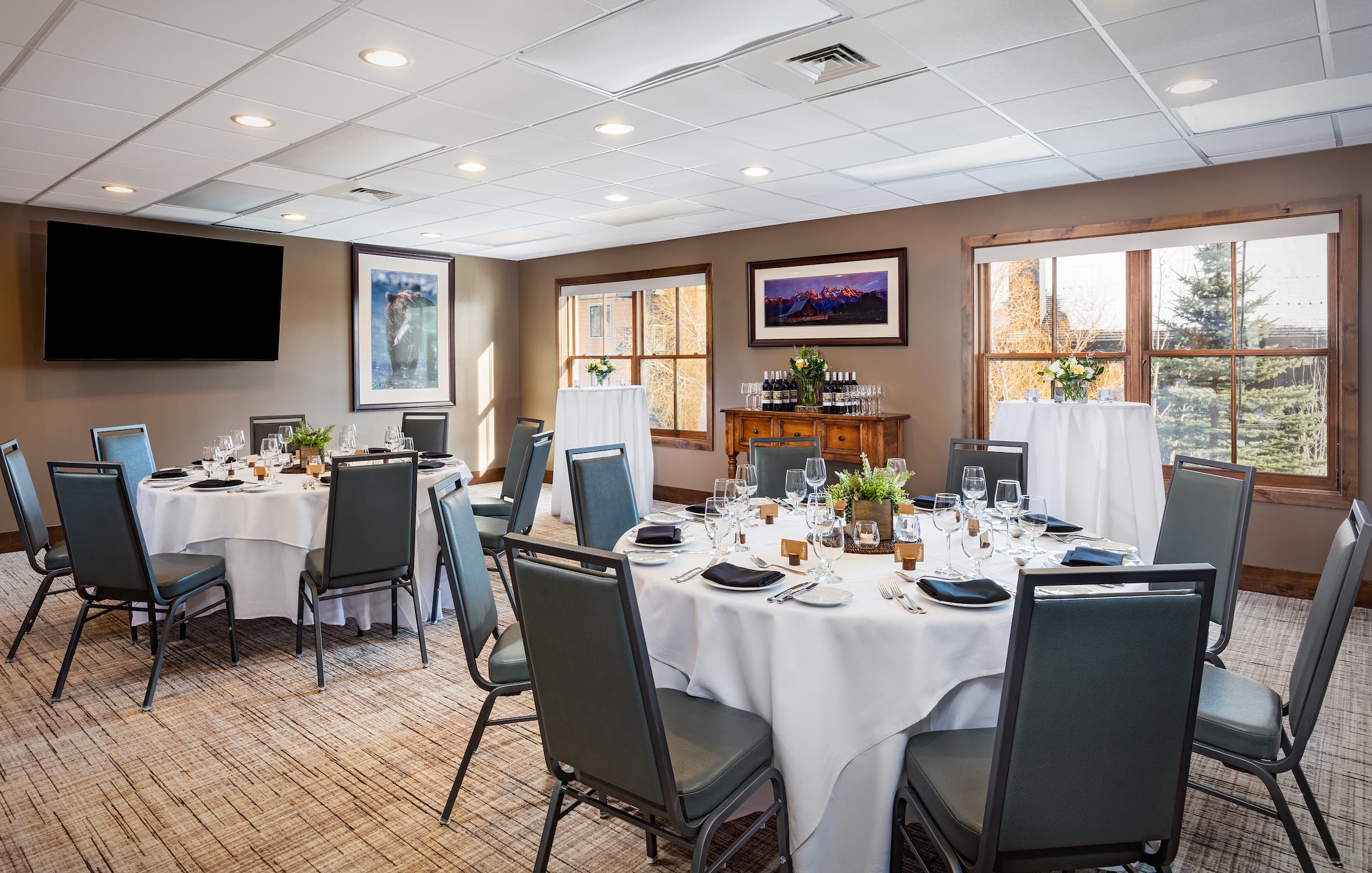 Meeting rooms with round table seating plan in the Four Pines Meeting Room venue at Hotel Terra in Jackson Hole, Wyoming.