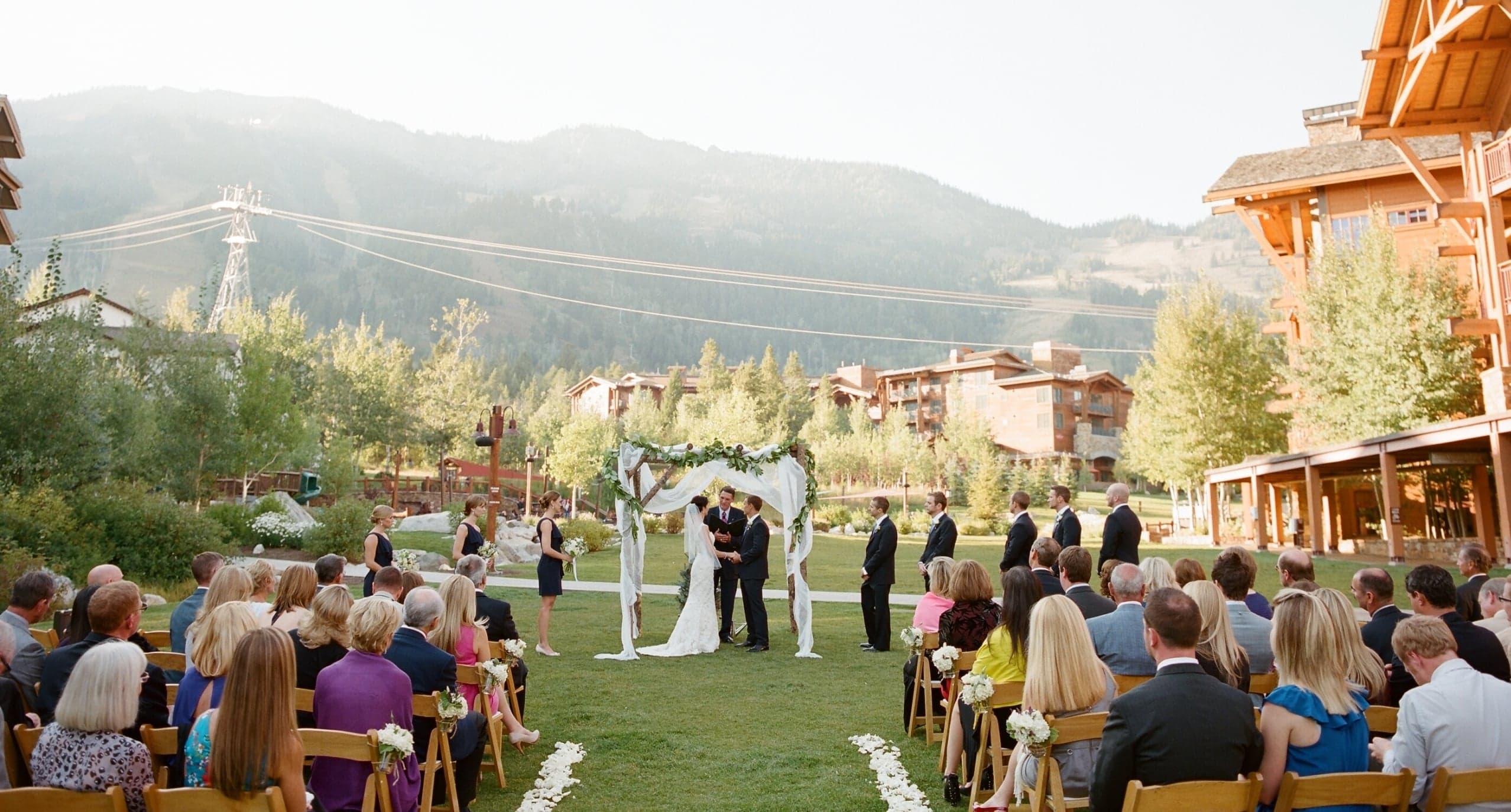 Outdoor Summer wedding ceremony at the Village Commons in Jackson Hole, Wyoming.